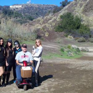 L to R Vanessa Suarez Rosanna Eizutto Michelle Jubilee Gonzalez Scott Rhodes Olivia Dunkley  and Esther and Jerry Kokich on set for Adventures of Superseven Bronson Caves