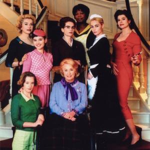 Catherine Deneuve (far left), Virginie Ledoyen (left), Ludivine Sagnier (bottom left), Danielle Darrieux (bottom center), Isabelle Huppert (middle center), Firmine Richard (top center), Emmanuelle Béart (right), and Fanny Ardant (far right).