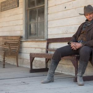 Brett Rickaby on set of A Million Ways to Die in the West as Charlie Blanche