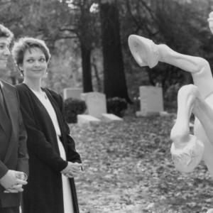 Still of Pamela Reed and Peter Riegert in Passed Away 1992