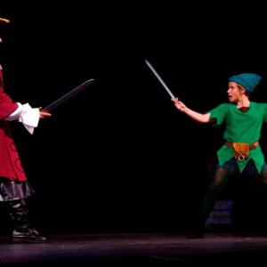Roger Rignack as Captain Hook dueling Peter Pan