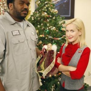 Still of Craig Robinson and Angela Kinsey in The Office 2005
