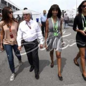 Nichole Galicia with Bernie Ecclestone and his wife Fabiana walking the Formula 1 grid in Montreal.