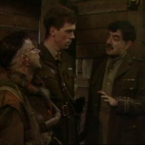 Still of Rowan Atkinson Hugh Laurie and Tony Robinson in Blackadder Goes Forth 1989
