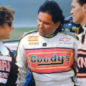 Tom Cruise Don Simpson and Michael Rooker on the set of Days of Thunder