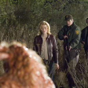 Still of Elizabeth Banks, Nathan Fillion, Michael Rooker and Don Thompson in Slither (2006)