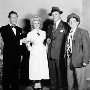 From left to right: Eddie Garr, Jean Carroll, Lyle Talbot and Harry Rose.