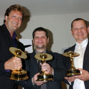 Jake Garber, Matt Rose and Mike Elizalde accepting Best Makeup Saturn Awards for 