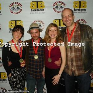 The cast of Suck It Up Buttercup with their awards for Best Ensemble Cast from the Bare Bones International Music Film Festival 2014
