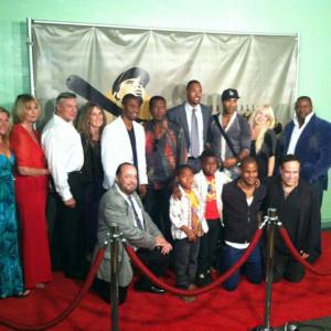 Director Richard Rossi first row far right kneeling at Hollywood premiere of his film Baseballs Last Hero 21 Clemente Stories with some of the cast
