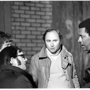 Left to Right, Rick Rothery (Assistant Producer), Ralph Desiderio (Producer), Don Schain (Director), and Technical Police Consultant on location shooting of 