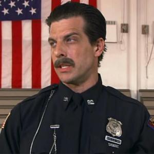 Mitch Rouse as Officer Sivilian from Strangers With Candy