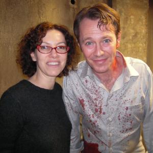 Elizabeth Rowin and Peter Outerbridge on the set of SAW VI.