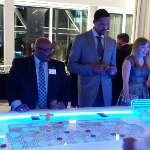 The Orlando Magic hosts a corporate VIP event in the Dr Phillips Center Channing Frye  Kevin Rushing enjoy a mock casino night in the Rich DeVoss Family Room