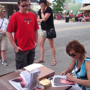 Signing autographs at Strawberry Festival, NC
