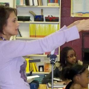 Irene Santiago teaching acting young minds at a middle school