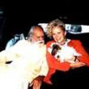 Sri Swami Satchidananda with long time devotee Golden Globe win Actress Sally Satya Kirkland and Siva enroute to Oliver Stones Santa Monica Offices 1998
