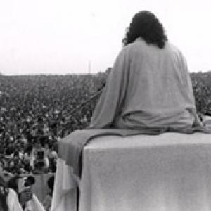 Legendary Woodstock Guru Sri Swami Satchidananda offering Blessing at Woodstock festival 1969