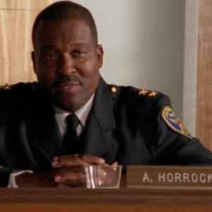 Rodney Saulsberry as First Panel Member Officer Horrocks on an episode of MONK
