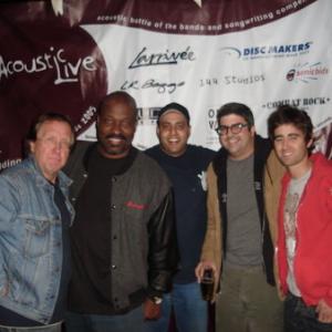Rodney Saulsberry is the voice of FASTO on the animated cartoon series MINORITEAM Hes joined here by cast members at the premiere party