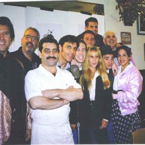 With the cast of 