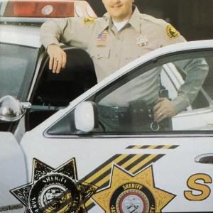 Standing by my San Bernardino County patrol car 1995 Our department issued a type of baseball trading card for us to hand out