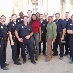 Gregory Schmauss Jay Karnes CCH Pounder group shot with other actors from the FX TV series The Shield