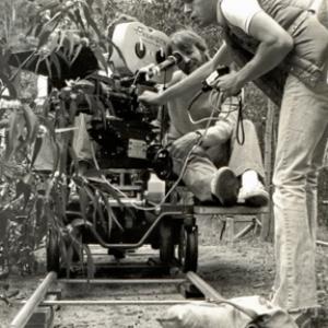 Director David Schmoeller rides the dolly on the set of TOURIST TRAP 1978 Los Angeles