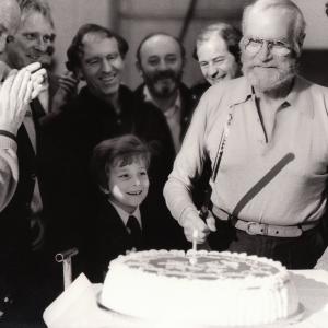 L to R Ray Harryhausen Producer Desmond Davis Director Jaxon Gwillm Son of actor Jack Gwillim who played Poseidon Sir Laurence Olivier Zeus and Harry Hamlin Perseus  Cast and crew celebrate Laurence Oliviers 72nd birthday on the set