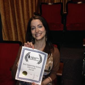 Heidi Schooler wins Best Supporting Actress in film Desk Job for playing 3 characters