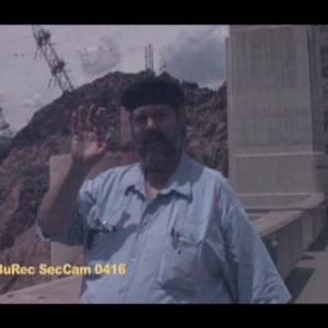 J. Neil Schulman as Ali, at Hoover Dam, in a scene from Lady Magdalene's.