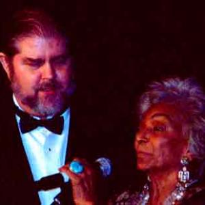 J Neil Schulman with Nichelle Nichols accepting Audience Choice award for Lady Magdalenes at the 2009 Cinema City International Film Festival Awards Banquet