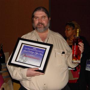 DirectorProducerWriter J Neil Schulman accepting Best Cutting Edge Film Award from San Diego Black Film Festival for Lady Magdalenes February 2 2008