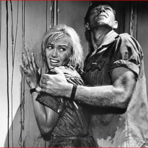 Still of Kieron Moore and Janette Scott in Crack in the World 1965