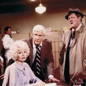 Police Squad: Kathryn Leigh Scott as Sally Decker with Leslie Nielsen and Alan North