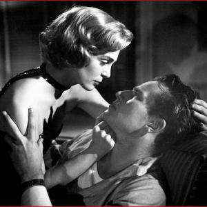 Still of Charlton Heston and Lizabeth Scott in Dark City 1950
