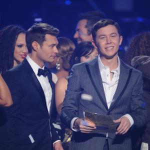 Still of Ryan Seacrest and Scotty McCreery in American Idol The Search for a Superstar 2002