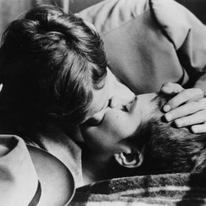 American actress Jean Seberg (1938 - 1979), as Patricia Franchini, and French actor Jean-Paul Belmondo as Michel Poiccard, in a love scene from 'Breathless' ('A bout De Souffle'), directed by Jean-Luc Godard, 1960.