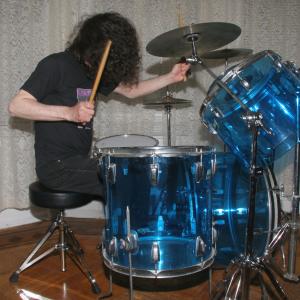 Playing my vintage early 1970's Ludwig Blue Vistalite John Bonham-style drums.