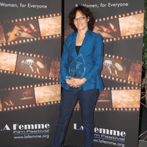 receiving award at La Femme International Film Festival