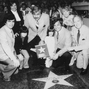 LR Mike Simms Joyce Sherman Robert J Sherman Robert B Sherman Vicky Sherman Richard M Sherman Ursula Sherman Cliff Gill November 17 1976 induction at the Hollywood Walk of Fame across the street from the Chinese Theatre