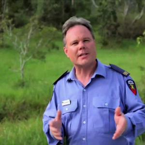 Still of Murray Shoring presenting 'Prepare, Act, Survive' for QLD Fire Service