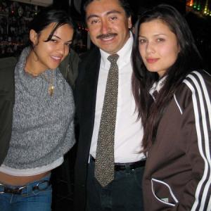 WEST HOLLYWOOD CA  MARCH 28 Actress Michelle Rodriguez L actorphotographer Alexander Sibaja and actress Natassia Malthe pose while at The Rainbow Bar  Grill on March 28 2005 in West Hollywood California