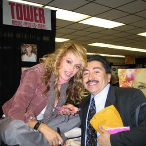 HOLLYWOOD CA  FEBRUARY 11 Latin singeractress Paulina Rubio  actorphotographer Alexander Sibaja at Tower Records for a signing of her new cd named PAULATINA on February 11 2004