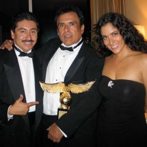 BEVERLY HILLS CA  OCTOBER 14 Actorphotographer Alexander Sibaja L President Of Nosotros Jerry Velasco and actress Yvonne De La Rosa pose as they attend private after party for the 35th Annual Nosotros Golden Eagle Awards at the Beverly Hilton Hotel on October 14 2005 in Beverly Hills California
