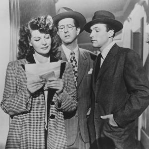 Still of Rita Hayworth Gene Kelly and Phil Silvers in Cover Girl 1944