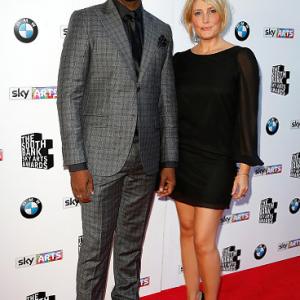 Nicholas Pinnock and Mika Simmons attend the South Bank Sky Arts Awards at The Savoy Hotel on June 7, 2015 in London, England