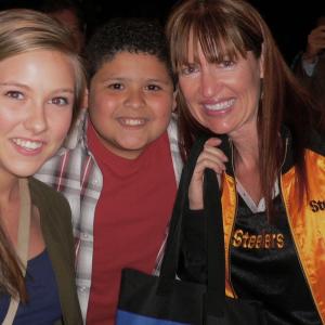 Trisha Simmons, Rico Rodriguez, Anna-Claire Sneed on Modern Family Set