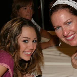 Trisha Simmons and Miley Cyrus at a Fundraiser for Kids.
