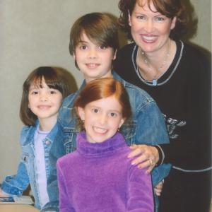 Trisha Simmons, Alexander Gould, Emma Gould and Kelly Gould at an Autograph Signing